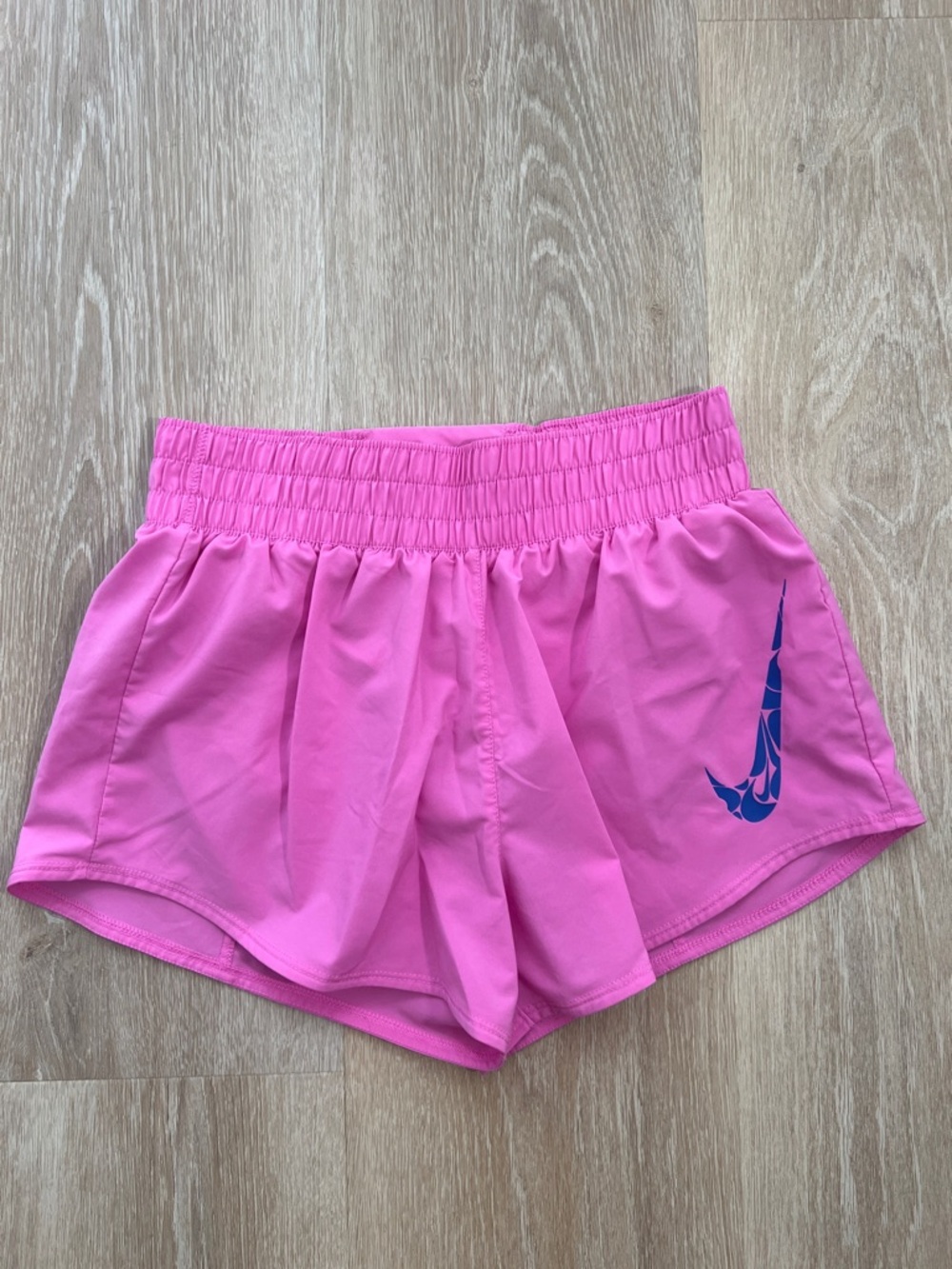 Nike Hot Pink Women's Athletic Shorts with Blue Swoosh